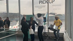 Kareem Thompson performs for T4 customers traveling with Caribbean Airlines as they board their flight. Kareem Thompson performs for T4 customers traveling with Caribbean Airlines as they board their flight.
