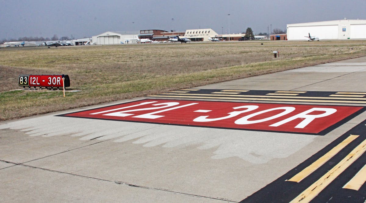 St. Louis Downtown Airport obliterated and replaced surface painted signs and two intersections were completely relocated away from the runway.