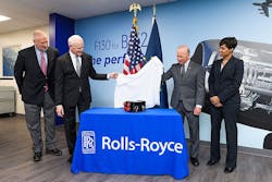 Unveiling an electronic engine controller for the Rolls-Royce AE 3007H jet engine during an announcement of a new engine controls facility in Discovery Park District are from left Brian Edelman, president of Purdue Research Foundation; Tom Bell, president of defense and CEO of Rolls-Royce North America; Mitch Daniels, Purdue University president; and Candice Bineyard, director of defense programs for Rolls-Royce North America. Unveiling an electronic engine controller for the Rolls-Royce AE 3007H jet engine during an announcement of a new engine controls facility in Discovery Park District are from left Brian Edelman, president of Purdue Research Foundation; Tom Bell, president of defense and CEO of Rolls-Royce North America; Mitch Daniels, Purdue University president; and Candice Bineyard, director of defense programs for Rolls-Royce North America.
