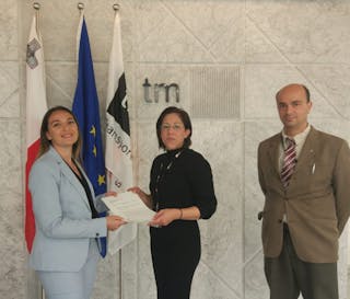 Rachel Grech, Head of Personnel licencing and Ruben Farrugia, Inspecting Officer from Transport Malta, Civil Aviation Directorate, handing the CCTO approval certificate to Stephanie Vella-Gera, Safety and Compliance Monitoring Manager, TAG Europe.