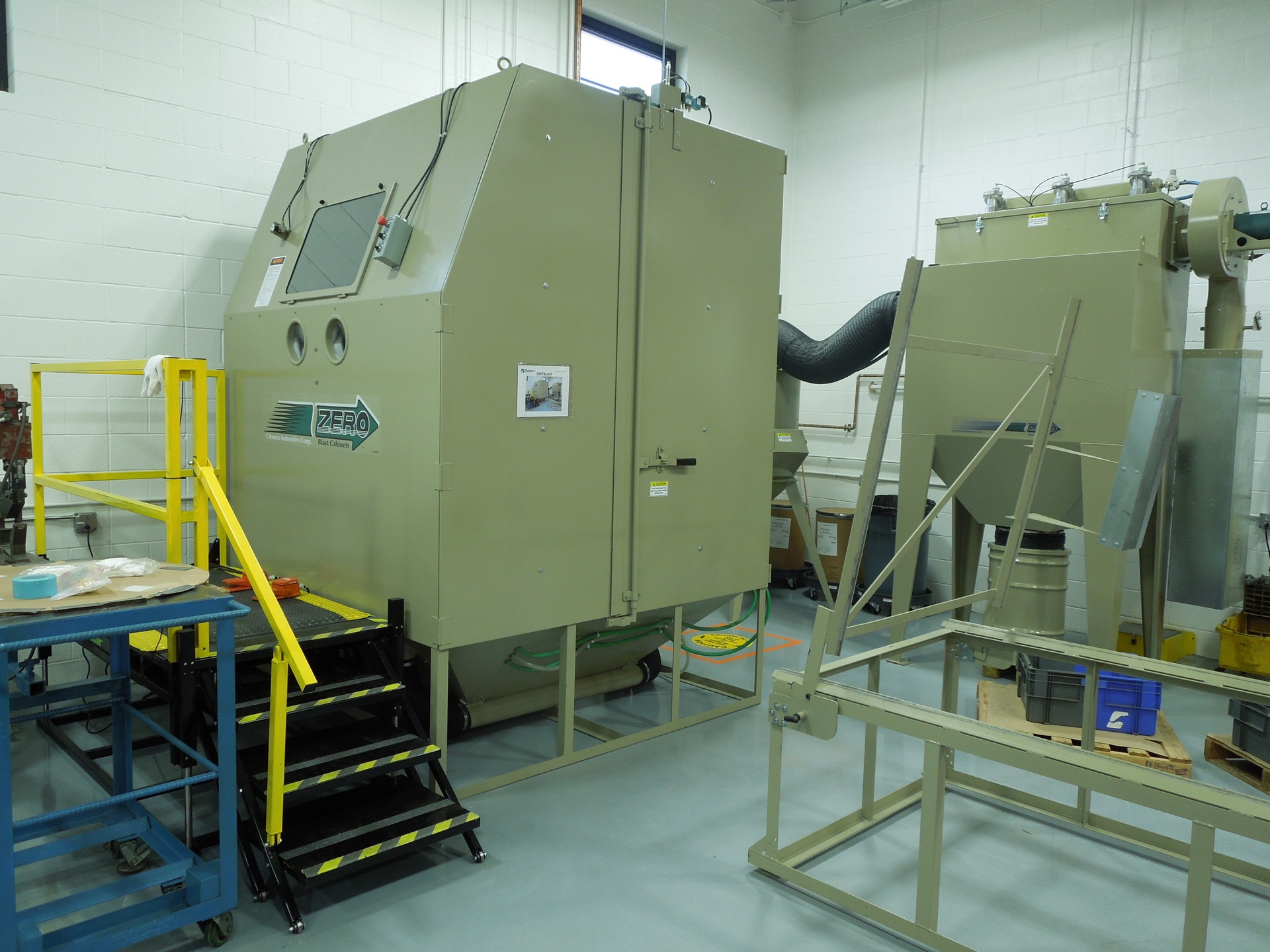 Clemco Industries Corp. manufactures the ZERO line of abrasive-blasting cabinets, such as MB Aerospace&rsquo;s modified ZERO BNP-7212 cabinet at its facility in East Granby, Connecticut. The cabinet is equipped with a 1200 CFM reverse-pulse dust collector and a 1200 CFM reclaimer.