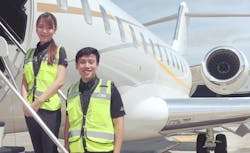 Kelly Goh and Shahridan Heng, Flight Operations, Seletar following completion of their Safety 1st online training modules.