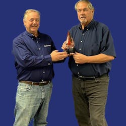 Don Redwine (left) presents the Lifetime Achievement award to Larry Laney.