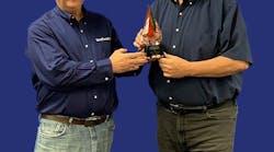 Don Redwine (left) presents the Lifetime Achievement award to Larry Laney.