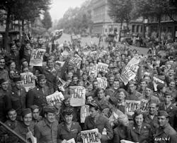 Allied personnel celebrate the Japanese surrender in Paris.