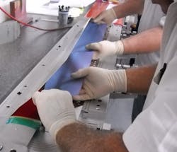 Technicians prepare for the re-build of a H-3 Tail rotor blade. Technicians prepare for the re-build of a H-3 Tail rotor blade.