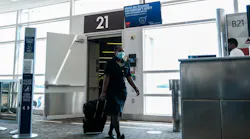 A flight attendant exits a Delta Airlines flight at the Ronald Reagan National Airport on July 22, 2020 in Arlington, Virginia.