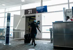 A flight attendant exits a Delta Airlines flight at the Ronald Reagan National Airport on July 22, 2020 in Arlington, Virginia. A flight attendant exits a Delta Airlines flight at the Ronald Reagan National Airport on July 22, 2020 in Arlington, Virginia.