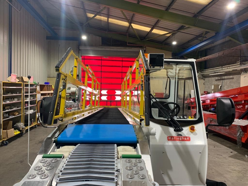 A belt loader with Mallaghan's controlled approach system installed.