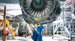 Maintenance is done on a 737 engine.