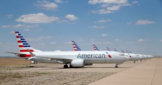 Eight of about a dozen grounded American Airlines Boeing 737 Max 8 aircraft are parked on a remote taxiway at Roswell International Air Center in Roswell, New Mexico, Wednesday, Sept. 4, 2019.