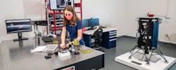 Taylor Yow, an Aerospace Engineering undergrad, examines a camera lens at the optical table in the Space Technologies Lab at Embry-Riddle Aeronautical University. The Niceville, Florida, resident works on EagleCam’s sensing team and oversees project management. EagleCam will be capturing images of the Nova-C Lunar Lander (early model pictured in foreground) as it touches down on the Moon in fall 2021. Taylor Yow, an Aerospace Engineering undergrad, examines a camera lens at the optical table in the Space Technologies Lab at Embry-Riddle Aeronautical University. The Niceville, Florida, resident works on EagleCam’s sensing team and oversees project management. EagleCam will be capturing images of the Nova-C Lunar Lander (early model pictured in foreground) as it touches down on the Moon in fall 2021.