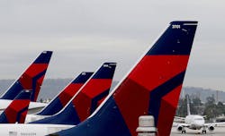 Delta Airlines aircraft are lined up at Terminal 5 in Los Angeles International Airport on Dec. 21, 2016. Delta has overhauled how it cleans airplanes and operates at airports to attract people back to flying. Delta Airlines aircraft are lined up at Terminal 5 in Los Angeles International Airport on Dec. 21, 2016. Delta has overhauled how it cleans airplanes and operates at airports to attract people back to flying.