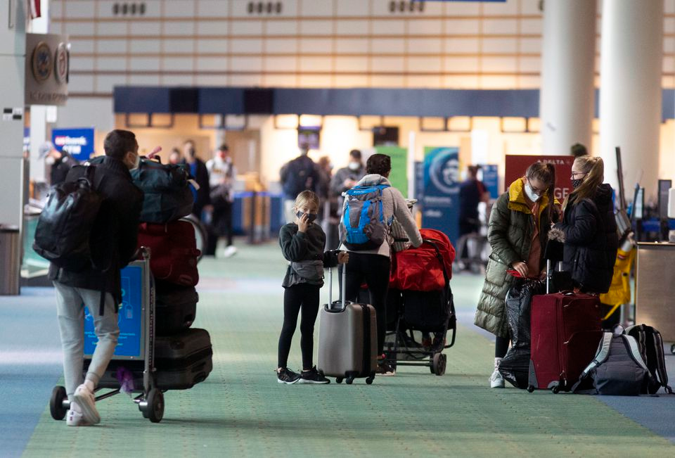 Late morning brought a steady flow of travelers through Portland International Airport, though did not have crowds typically seen on the day before Thanksgiving. November 25, 2020