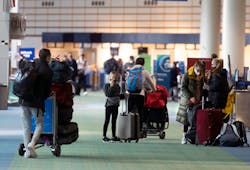 Late morning brought a steady flow of travelers through Portland International Airport, though did not have crowds typically seen on the day before Thanksgiving. November 25, 2020 Late morning brought a steady flow of travelers through Portland International Airport, though did not have crowds typically seen on the day before Thanksgiving. November 25, 2020