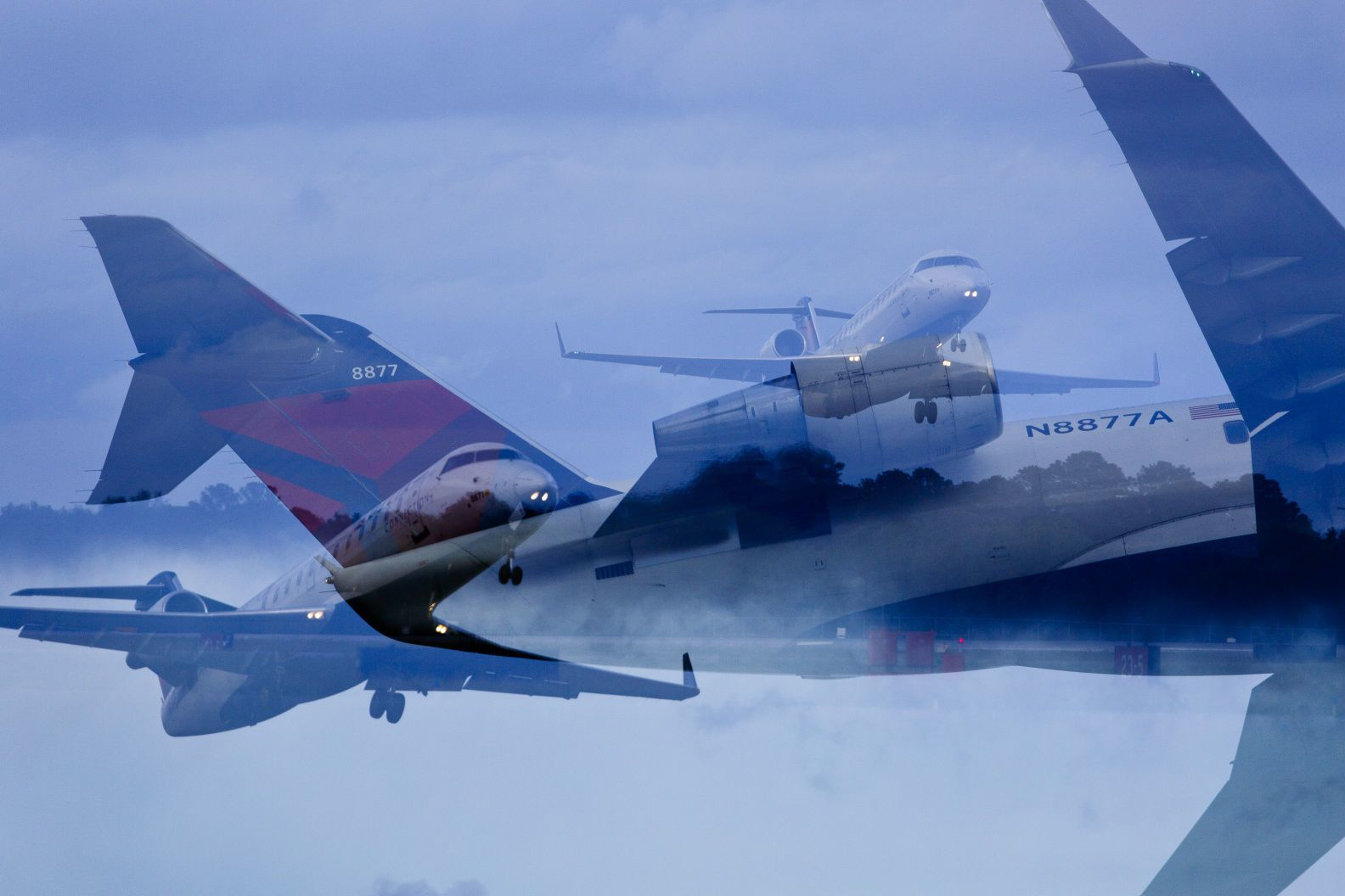 As seen in a multiple exposure image, an airplane take off from Norfolk International Airport in Norfolk on Friday, May 6, 2016.