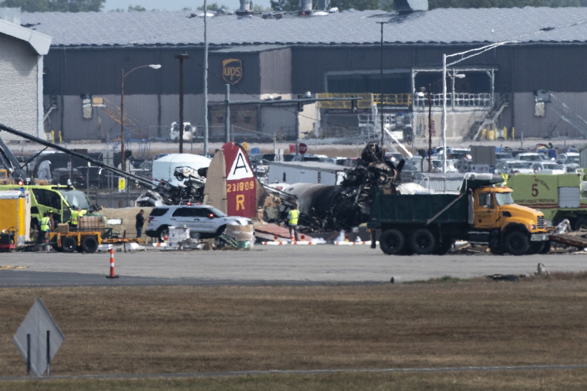 Emergency crews respond to a WWII B-17 bomber crash that happened just before 10 a.m. at Bradley International Airport Wednesday, Oct. 2, 2019, in Windsor Locks.