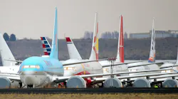 Some of the hundreds of completed Boeing 737 MAX planes destined for airlines worldwide are parked at an airport in Moses Lake, Washington in November 2019. Boeing on Tuesday delivered its first 737 MAX in 21 months, the first since the Federal Aviation Administration ungrounded the jet last month.