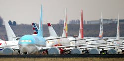 Some of the hundreds of completed Boeing 737 MAX planes destined for airlines worldwide are parked at an airport in Moses Lake, Washington in November 2019. Boeing on Tuesday delivered its first 737 MAX in 21 months, the first since the Federal Aviation Administration ungrounded the jet last month. Some of the hundreds of completed Boeing 737 MAX planes destined for airlines worldwide are parked at an airport in Moses Lake, Washington in November 2019. Boeing on Tuesday delivered its first 737 MAX in 21 months, the first since the Federal Aviation Administration ungrounded the jet last month.