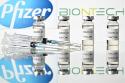 An illustration picture shows vials with Covid-19 Vaccine stickers attached and syringes with the logo of US pharmaceutical company Pfizer and German partner BioNTech, on November 17, 2020. An illustration picture shows vials with Covid-19 Vaccine stickers attached and syringes with the logo of US pharmaceutical company Pfizer and German partner BioNTech, on November 17, 2020.