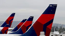 Delta is eliminating fees for changing plans on most international ticket bookings. It's the latest sign of the effort by airlines to encourage people to fly again.