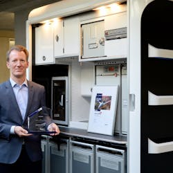 Beat Burlet, CEO Bucher with Airbus Award.