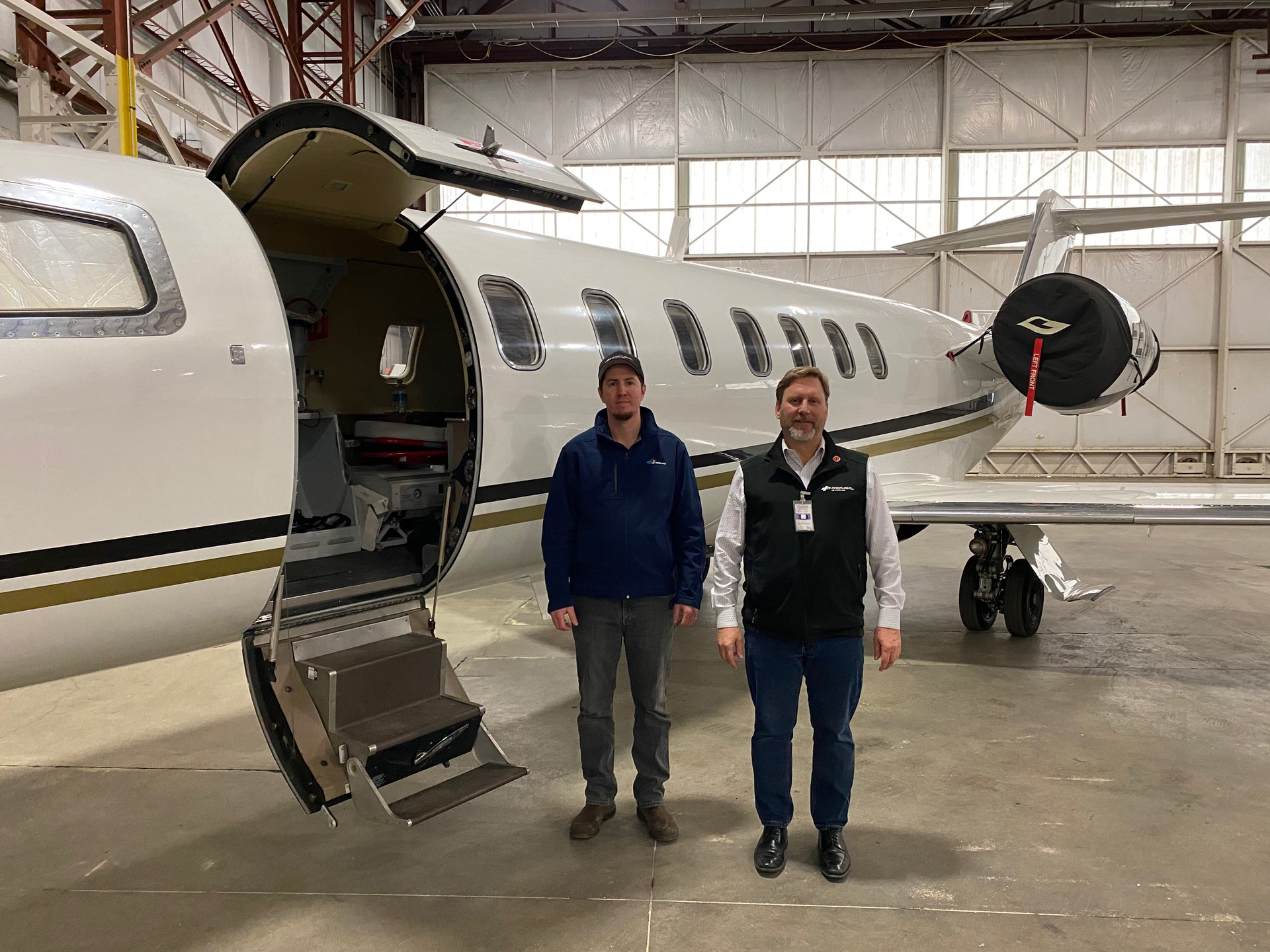 David Fox (right) and Nick Fraser at the Fox Flight hangar.