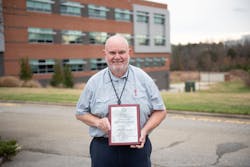Program Director for the Aviation Electronics Technology Program at Guilford Technical Community College, Larry Belton, with the Charles Taylor Master Mechanic Award.