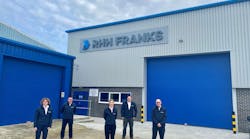 Managing director Elsa Hogan, front center, with staff at RHH Franks. The firm is marking its 60th anniversary with a rebrand.
