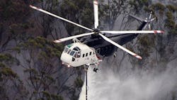 A Sikorsky S 61 Helicopter Performs A Water Drop During An Aerial Firefighting Mission 602c537a630d3 A Sikorsky S 61 Helicopter Performs A Water Drop During An Aerial Firefighting Mission 602c537a630d3