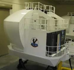 CAE will design and manufacture a P-8A flight simulator for the Royal New Zealand Air Force similar to the P-8A operational flight trainer shown above already delivered to the U.S. Navy. CAE will design and manufacture a P-8A flight simulator for the Royal New Zealand Air Force similar to the P-8A operational flight trainer shown above already delivered to the U.S. Navy.