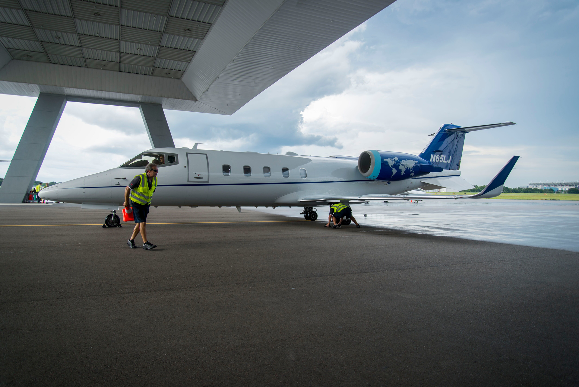 A Jet ICU air ambulance moves under an awning at Tampa International Airport Jet Center on Aug. 28, 2015.