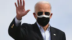 President Joe Biden boards Air Force One at Joint Base Andrews in Maryland on February 26, 2021. An intruder wandered the grounds of the base unsupervised for more than five hours last month, an internal watchdog investigation has found.