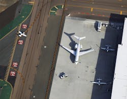 Planes on the ground at McClellan-Palomar Airport. Planes on the ground at McClellan-Palomar Airport.