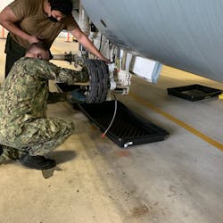 Usmc Maintainers Install Collins Wheels And Brakes On A C 130 At Navy Air Station New Orleans