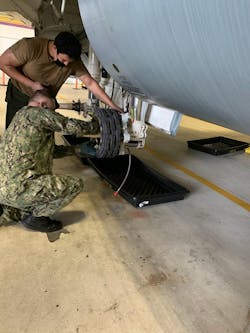 Usmc Maintainers Install Collins Wheels And Brakes On A C 130 At Navy Air Station New Orleans