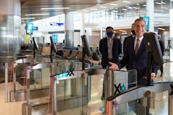 LA Mayor Eric Garcetti going through the new automated biometric boarding gates at LAX during the West Gates inauguration on May 24. LA Mayor Eric Garcetti going through the new automated biometric boarding gates at LAX during the West Gates inauguration on May 24.