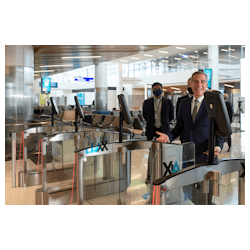 LA Mayor Eric Garcetti going through the new automated biometric boarding gates at LAX during the West Gates inauguration on May 24.