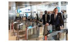 LA Mayor Eric Garcetti going through the new automated biometric boarding gates at LAX during the West Gates inauguration on May 24.