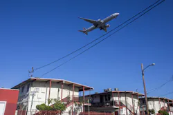 LENNOX, CA - JULY 21: Airplanes flying over residential neighborhoods on Wednesday, July 21, 2021 in Lennox, CA. Airplane noise accompanies daily living in several neighborhoods surrounding LAX. But some residents could soon catch a break, thanks to a 1.9-million grant this month from the Federal Aviation Administration to mitigate airport noise for more than 1,300 households in the cities of El Segundo, Los Angeles and Inglewood and in unincorporated parts of LA County such as Del Aire, Athens and Lennox.