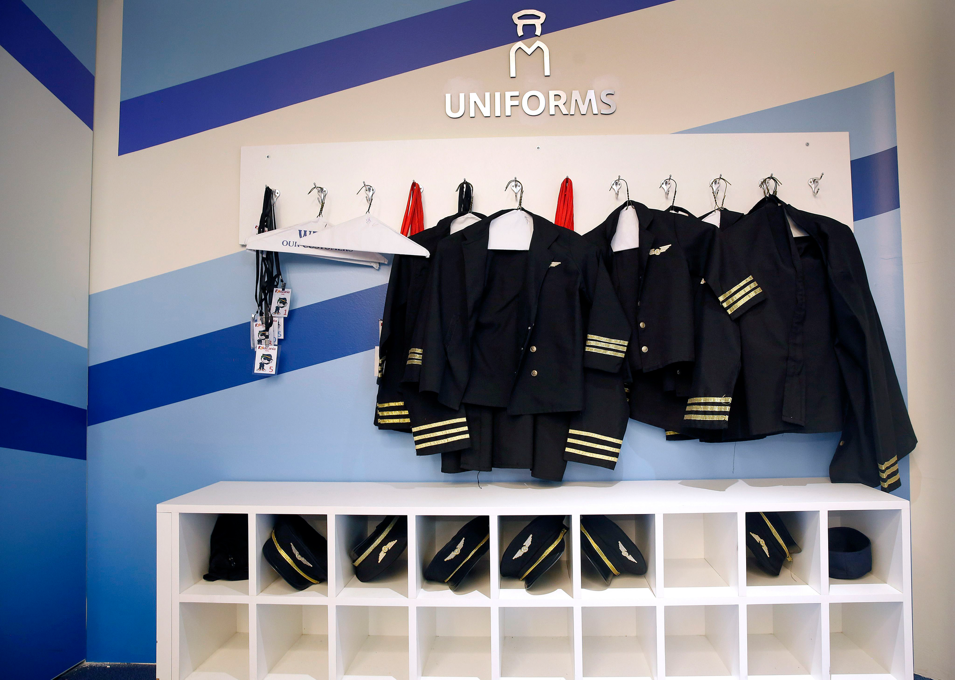 Kids can dress as American Airlines pilots as they fly planes in kid-sized flight simulators at KidZania Dallas, the company's only United States location at Stonebriar Mall At The Bridges in Plano, Texas, on July 16, 2021.