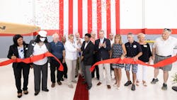 Inga Carus, co-founder of CL Enterprises, and Aurora Mayor Richard C. Irvin, cut a ribbon to celebrate the transition of LumanAir Aviation Services to Carver Aero at the Aurora, Illinois, Municipal Airport on National Aviation Day, Aug. 19. Inga Carus, co-founder of CL Enterprises, and Aurora Mayor Richard C. Irvin, cut a ribbon to celebrate the transition of LumanAir Aviation Services to Carver Aero at the Aurora, Illinois, Municipal Airport on National Aviation Day, Aug. 19.