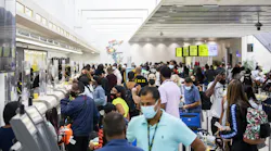 Passengers check in and wait by the Spirit Airlines ticket counter in Terminal 4 at Fort Lauderdale-Hollywood International Airport.
