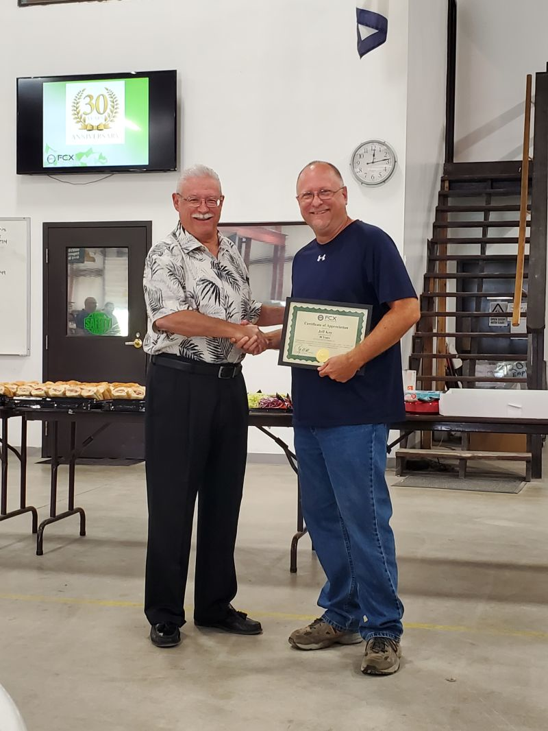Craig Walker, president and CEO of FCX Systems, Inc. (left) and Jeff Key (right).