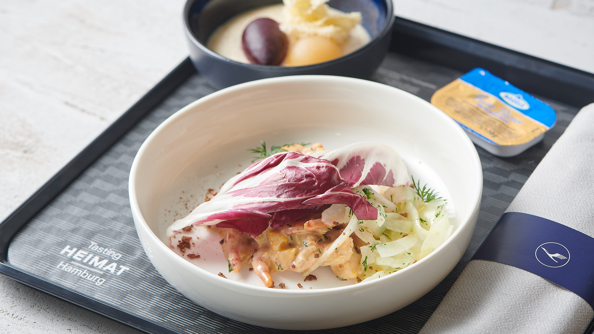 Hamburg cuisine is all about seafaring. On the menu is crab salad with a beetroot and potato terrine as an appetizer. Tasting Heimat, Lufthansa's new continental business class meal concept, brings German tastes of home on board.