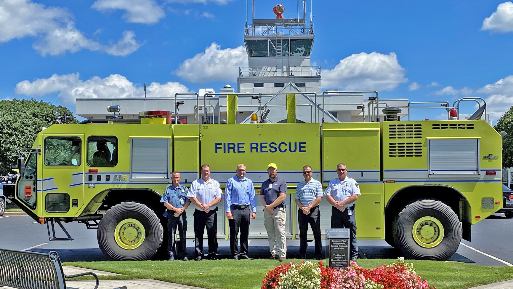 Representatives of GSP, GMU, and the City of Greenville Fire Department with GSP's Unit 3 specialized ARFF vehicle, now on loan to GMU.