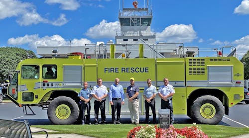 Representatives of GSP, GMU, and the City of Greenville Fire Department with GSP&apos;s Unit 3 specialized ARFF vehicle, now on loan to GMU.