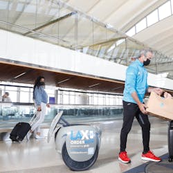 NomNom is a cargo robot that will carry up to 40 pounds of food at a time as it follows behind delivery staff from AtYourGate at LAX.