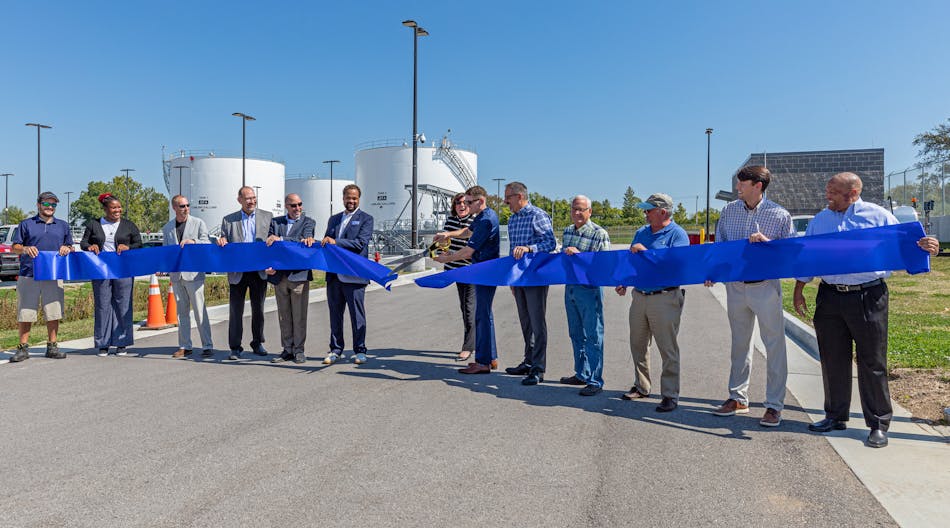 STL bulk fuel storage facility project stakeholders gather for an official ribbon-cutting at the new facility.