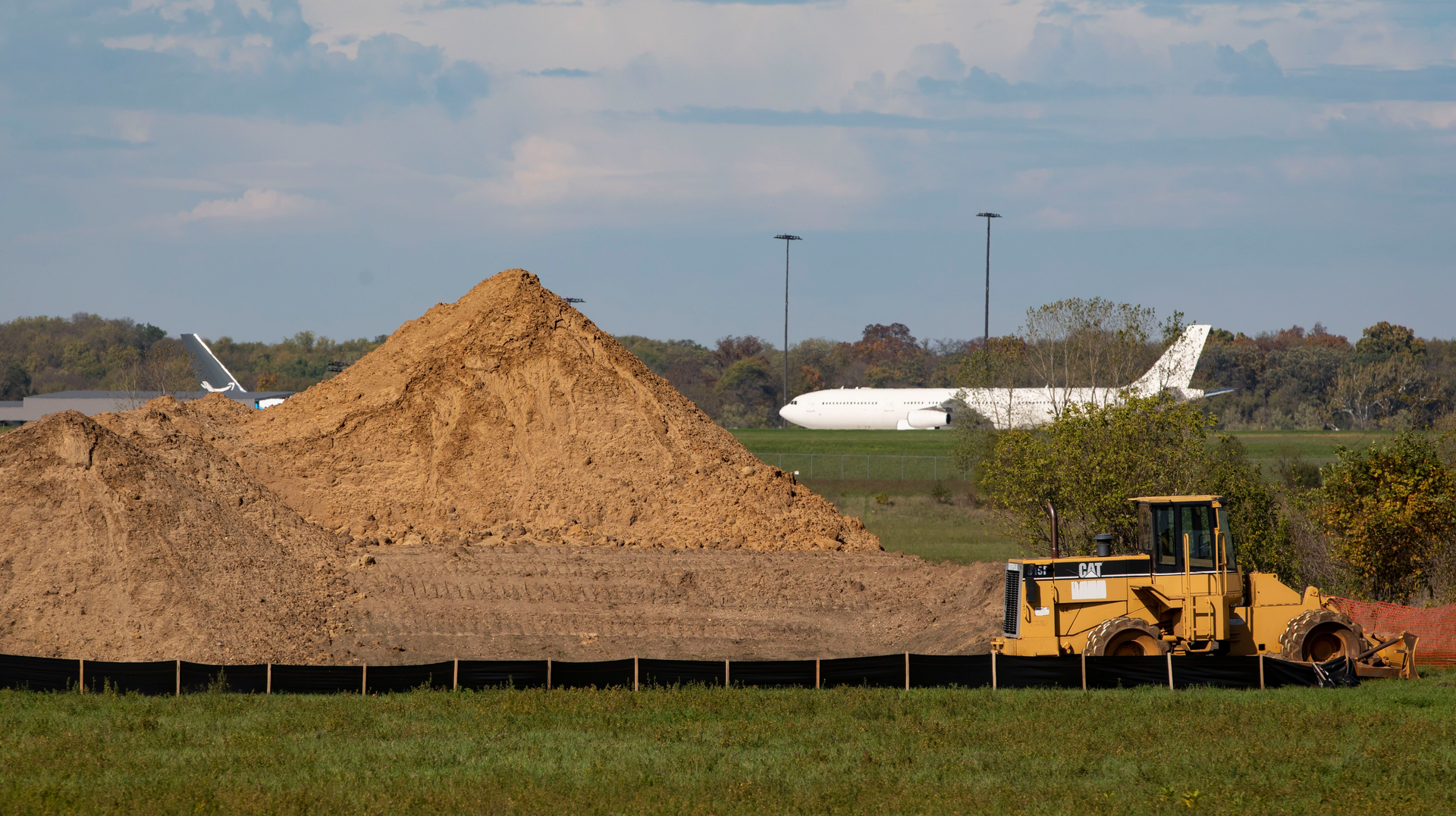 Cargo planes are visible behind the Bell Bowl Prairie near Chicago-Rockford International Airport on Oct. 20, 2021, in Winnebago County.